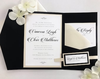 May include: Black and ivory wedding invitation with a pocket for an RSVP card. The invitation features the names "Vanessa Leigh" and "Chris Matthews" in elegant script. The date of the wedding is June 4, 2017. The invitation also includes the text "Leigh to Matthews" and the date of the wedding.
