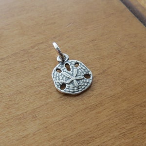 Solid 925 tiny little sterling silver sand dollar double sided charm or earrings - Chains are optional