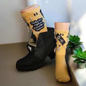 Junk socks with patches and pins.