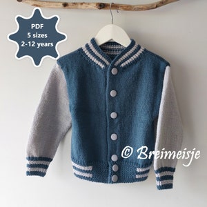 May include: A blue and grey knitted cardigan with a button-up front and striped trim. The cardigan is hanging on a wooden hanger. The text "PDF 5 sizes 2-12 years" is in a starburst shape above the cardigan. The text "© Breimeisje" is in the lower right corner of the image.