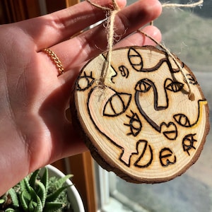 Wooden Abstract Faces Ornament