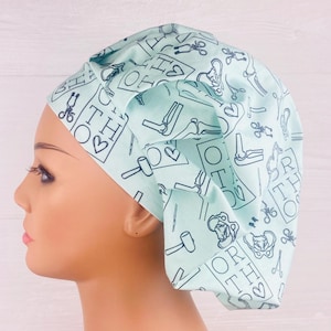 May include: A light blue surgical scrub hat with a repeating pattern of bones, hearts, and medical tools. The text "ORTH" is repeated throughout the pattern.