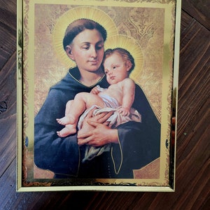 Sint-Antonius en het Christuskind.... vintage foto.... lichtgevend goud