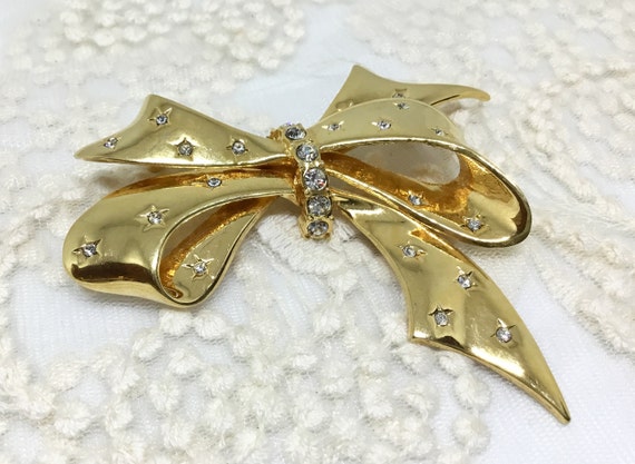 Vintage 1980s Joan Rivers Goldtone Rhinestone Bow