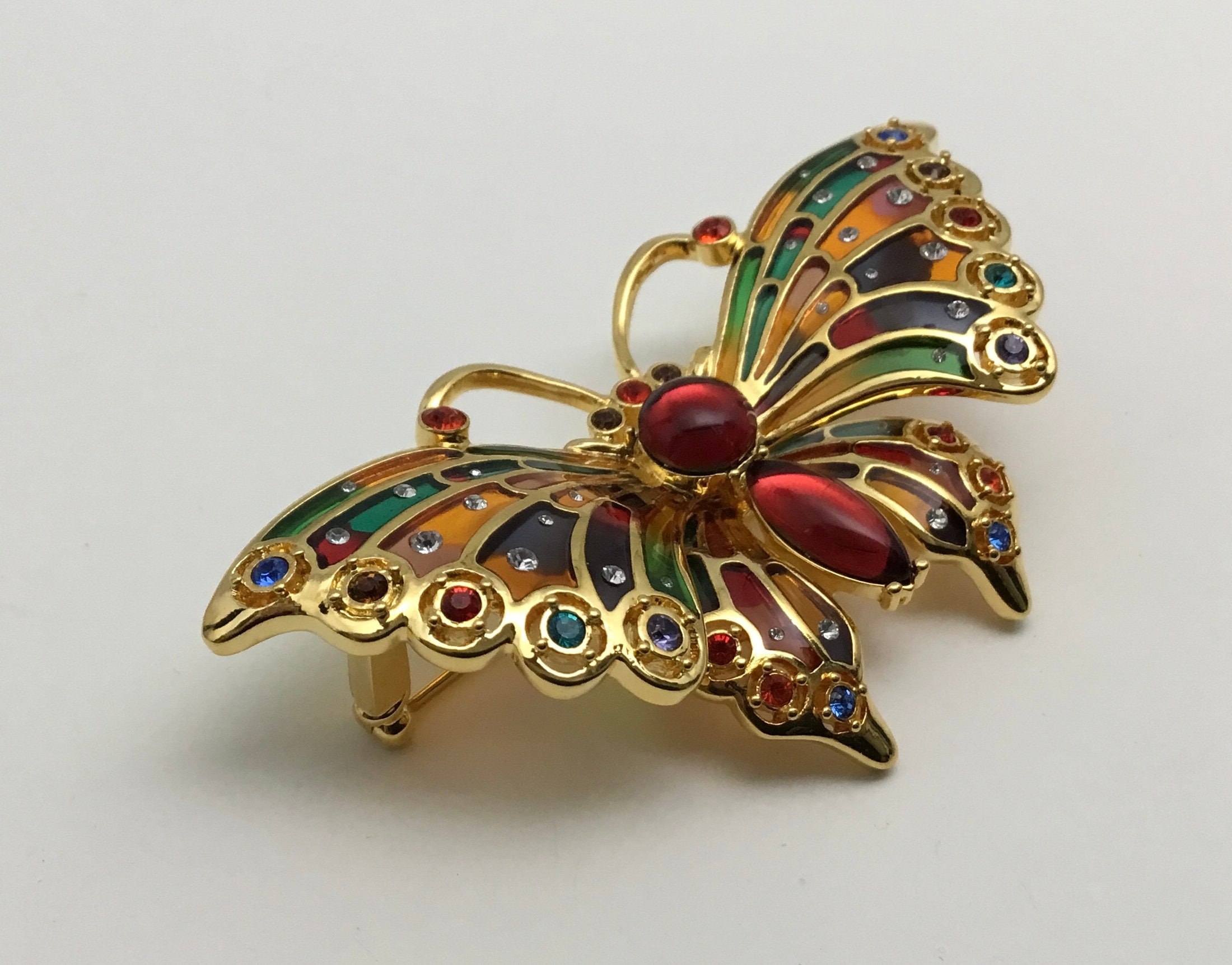 Joan rivers deals butterfly brooch