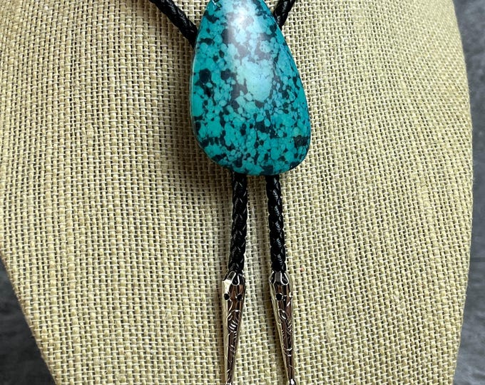 Bolo with Large Turquoise Cabachon, 4mm Leather Braid, Sterling Plated Silver Tips. 42 inch.