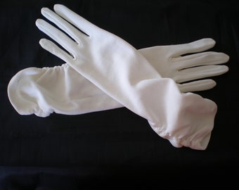 intage 1960s white nylon gloves - side ruching with slight stretch - size 6.5 approx. - for slim hand -mid elbow length -day or evening wear