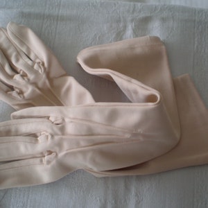 Vintage 1950s light beige ladies nylon gloves by Dents made in England -mid forearm size 6.5 for slim hand - day/evening wear - lightly used