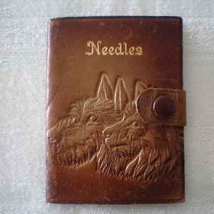 Vintage 1930s brown leather needle case by Kirby Beard & Co. England -embossed dog images -press stud fastening -neat size -cute kitsch gift