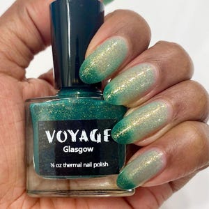 Thermal Temperature Changing Indie Nail Polish [Glasgow] changes colors from emerald green to sheer white and can be worn as a topper