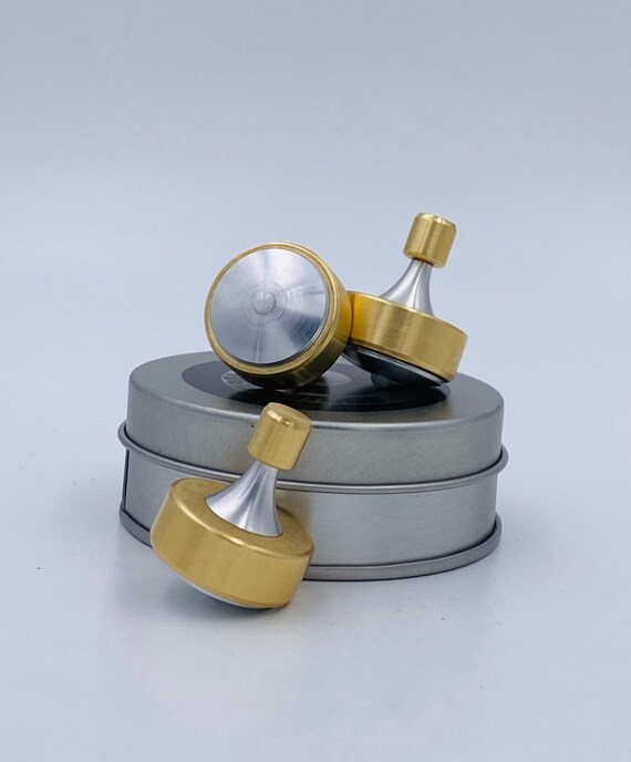Bi-metal Spinning Top