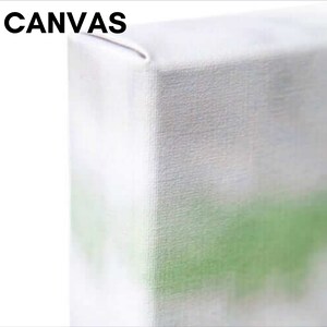 May include: Close-up of a white canvas texture with a subtle green gradient. The canvas is stretched and ready for painting.