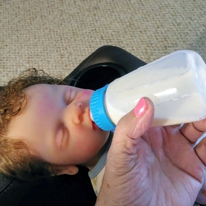 Solid Platinum Silicone Full body** boy***Open Mouth Takes Paci***