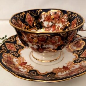 Vintage Royal Albert Bone China &quot;Heirloom&quot; Pattern Teacup and Saucer - Made in England