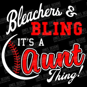 May include: A white baseball with red stitching and the text "Bleachers & Bling It's a Aunt Thing!" in red and white lettering on a black background.