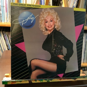 Dolly Parton vinyl record “The Great Pretender” near mint condition
