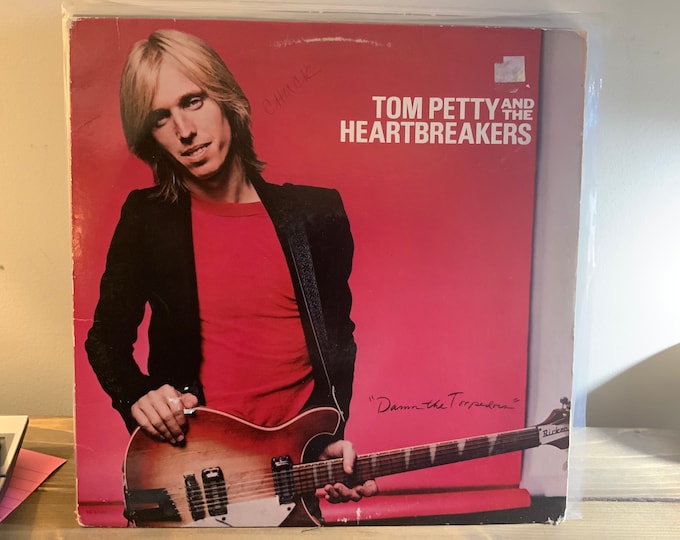 Tom Petty and the Heartbreakers vinyl record “Damn the Torpedoes “ in shrink wrap