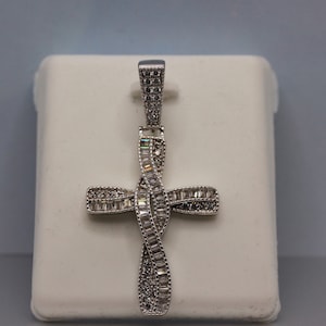 Sterling Silver Iced Out Baguette CZ Twisted Cross Pendant Sterling Silver Iced Out Cubic Zirconia Cross Pendant