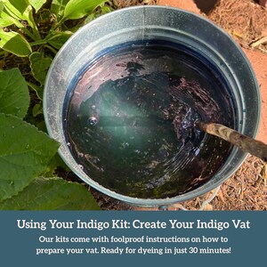 May include: A galvanized metal bucket filled with indigo dye. The dark blue liquid is being stirred with a wooden stick. The image includes text that reads, "Using Your Indigo Kit: Create Your Indigo Vat." The text continues, "Our kits come with foolproof instructions on how to prepare your vat."