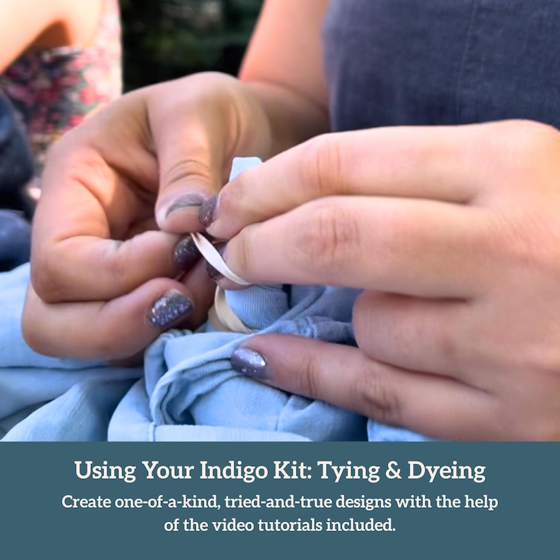 May include: A person's hands are shown tying a rubber band around a light blue fabric, preparing it for dyeing. The image is part of a tutorial for an indigo kit, with text that reads "Using Your Indigo Kit: Tying & Dyeing."