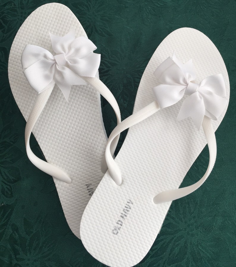 cute white flip flops