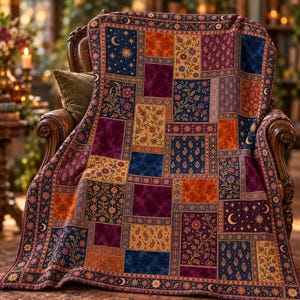 May include: A rectangular throw blanket featuring a patchwork design of various rectangular panels. The patterns include celestial motifs with moons and stars, floral arrangements, and paisley prints in deep shades of navy blue, plum, and orange.