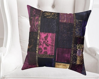 May include: A white armchair with a decorative pillow featuring a patchwork design in shades of pink, purple, and gold. The pillow has a velvet texture and a geometric pattern.