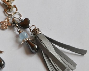 Tassel bag charm with guardian angel, reflective long tassel made for an angel, glow in the dark safety accessory, angel keychain