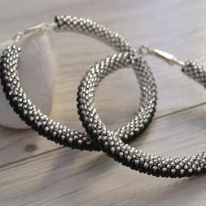 Shiny silver beaded hoop earrings, large seed bead black hoops, african jewelry, huge earrings, shiny jewelry, snake earrings