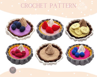 May include: Six crocheted mini pies with different fillings. The pies are made with brown, gray, and white yarn. The fillings include blueberries, strawberries, and bananas.