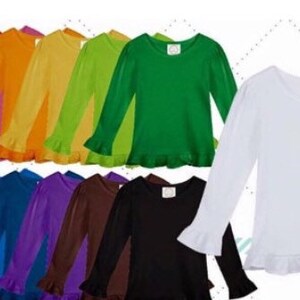 May include: A collection of long-sleeved shirts in various colors, including red, pink, orange, yellow, green, blue, purple, brown, black, and white. Each shirt has a ruffled hem and cuffs. The shirts are displayed on a white background.