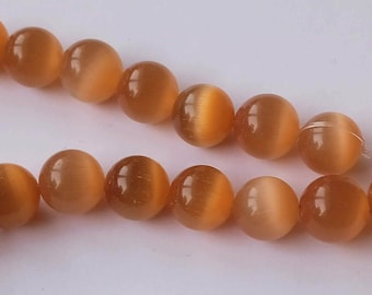 1 Strang Katzenauge orange Kugeln Perlen 10mm zur Schmuckherstellung