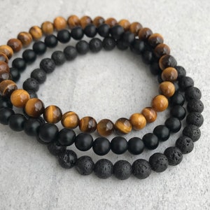 Bracelet triple perles pour homme - 6 mm, 8 mm ou 10 mm oeil de tigre jaune, lave et onyx mat, bracelet extensible en perles de pierres précieuses, cadeau pour lui