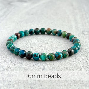 Puede incluir: Un brazalete de piedras preciosas turquesa y marr&oacute;n con cuentas de 6 mm. El brazalete est&aacute; hecho de piedras naturales y es una pieza de joyer&iacute;a hermosa y &uacute;nica.