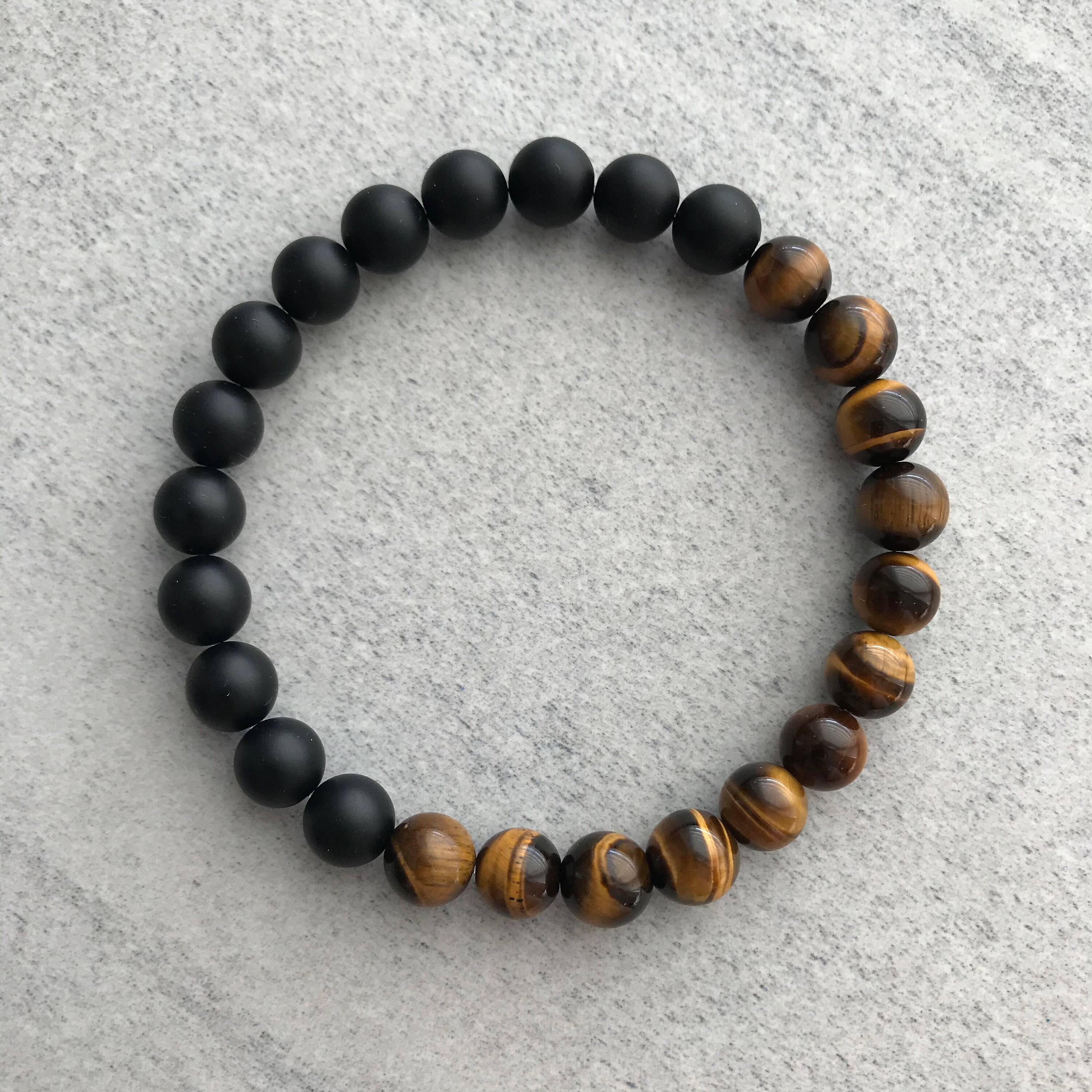 Men's Matte Black Onyx Tiger Eye Gemstone Beaded Stretch Jewelry Bracelet. Men's Matte Black Onyx Tiger Eye Gemstone Beaded Stretch Jewelry Bracelet.