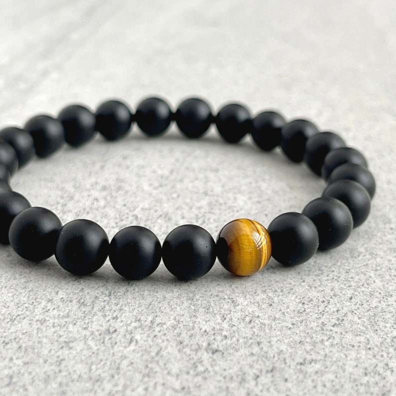 matte onyx beaded bracelet with a single yellow tiger eye bead, beaded bracelet for men, man bead bracelet, men's bracelet, man bracelet, men's beaded bracelet, stretch bracelet for men, crystal bracelet, made with strong stretchy cord