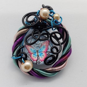 WP1012 - Wire Wrapped Rainbow Spiral Butterfly Pendant