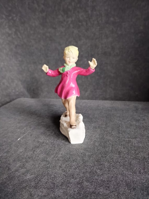 Royal Worcester JANUARY'S CHILD Boy - Freda Doughty Months of the Year Design #3452 - First Version Late Production - Boy Gliding on Ice