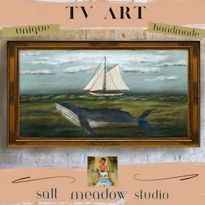 May include: A framed painting of a whale swimming in the ocean with a sailboat in the background. The painting is in a gold frame and has a blue, green, and white color scheme. The painting is titled "TV Art" and is described as "unique" and "handmade".