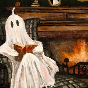 May include: A white ghost wearing a sheet sits in a plaid armchair by a fireplace. The ghost is reading a red book. The fireplace has a fire burning in it.