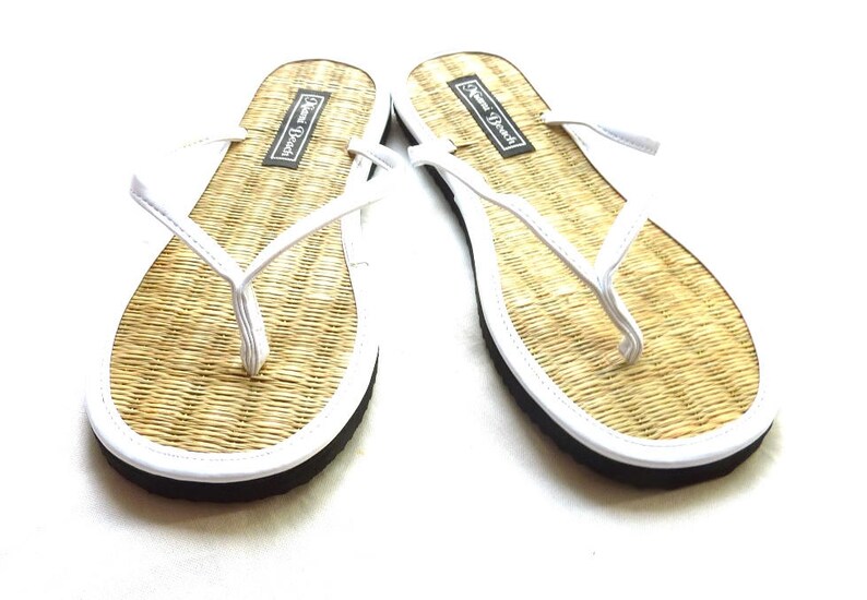 white leatherette slip on flip flops