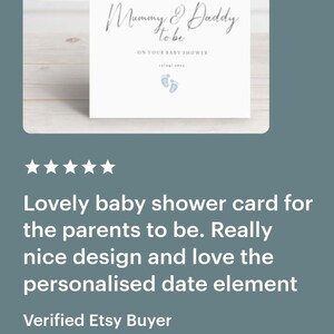 May include: A white baby shower card with the text "Mummy & Daddy to be" and "On your baby shower". The card features a pair of blue baby footprints.