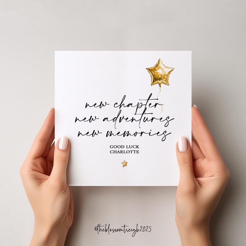 May include: A white card with the words "new chapter, new adventures, new memories" in black script. A gold star balloon and a small gold star are also featured. The card reads "Good Luck Charlotte".