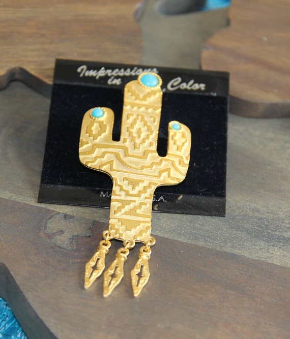 JJ Jonette Gold Tone Cactus with Blue stones Sout… - image 1