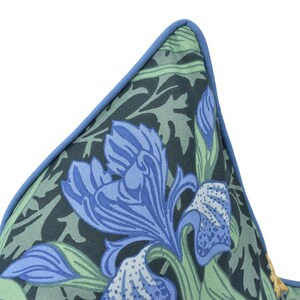 a close up of a tie with blue flowers on it