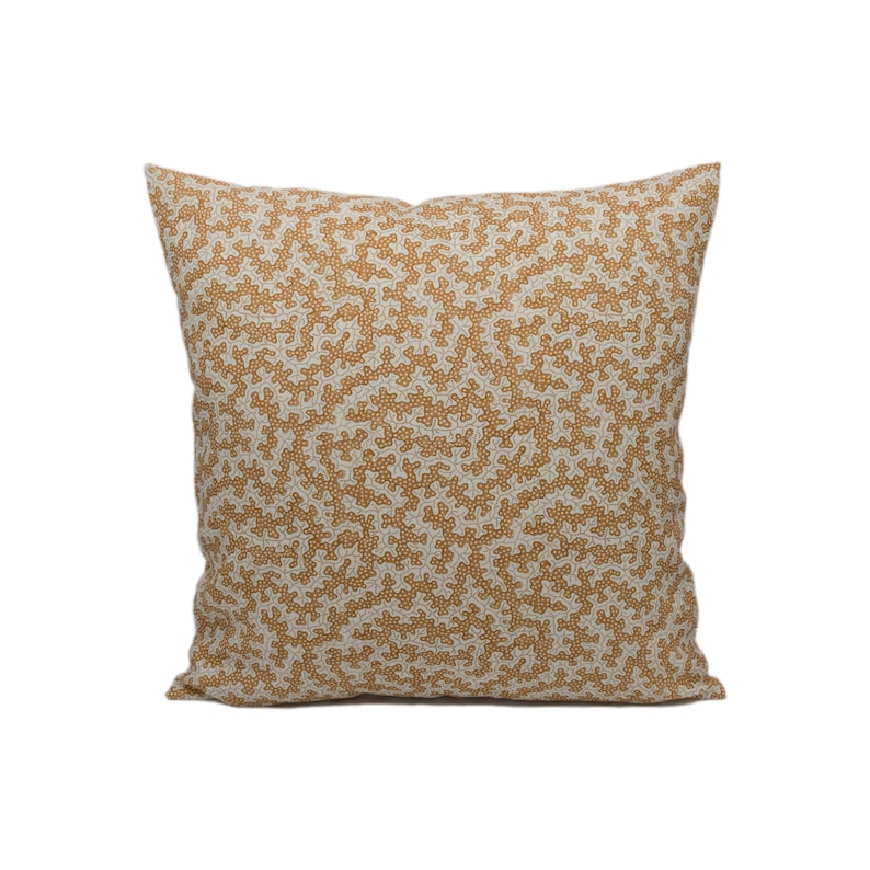 May include: A square throw pillow with a beige background and a brown coral-like pattern.