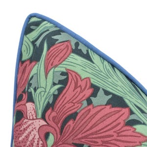 a close up of a tie with flowers on it