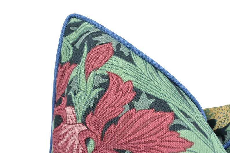 a close up of a tie with flowers on it