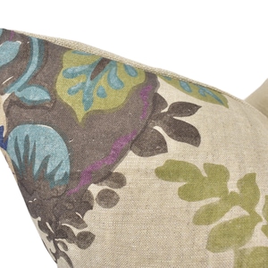 a close up of a pillow on a white background