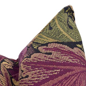 a close up of a pillow on a white background